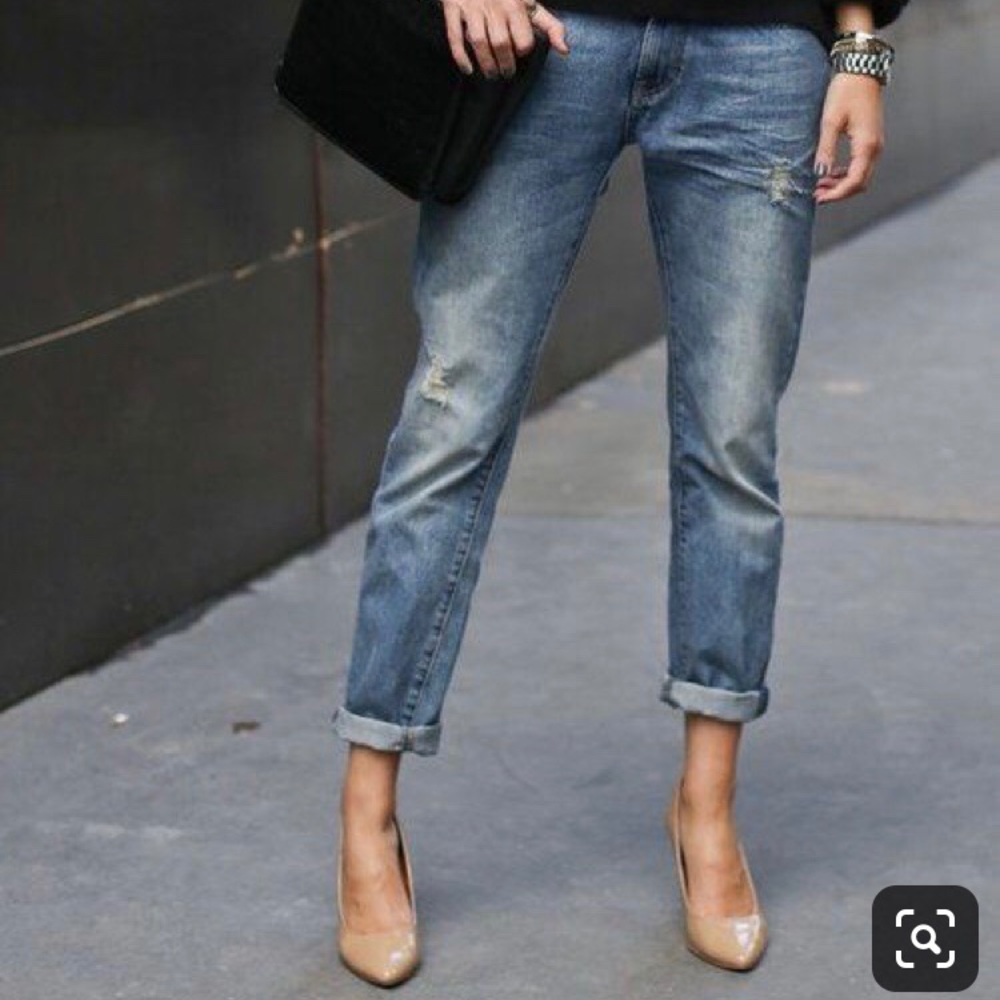 Calvin Klein distressed boyfriend jeans.